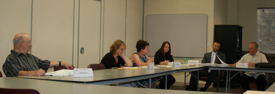 Four of five members of the McHenry County Ethics Commission John White, Cherie R. Rickert, Melissa M. Hernandez, and the Chairman Thomas B. Spencer. Besides the members, County Board Liaison John Jung was in attendance.