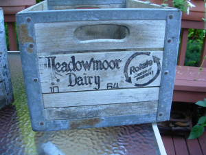 This is an old Meadowmoor Dairies Milk Crate. Meadowmoor Dairies was formed in 1931 by Al Capone.