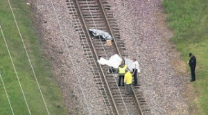 Phil Pagano lays dead on the tracks after an apparent suicide. 